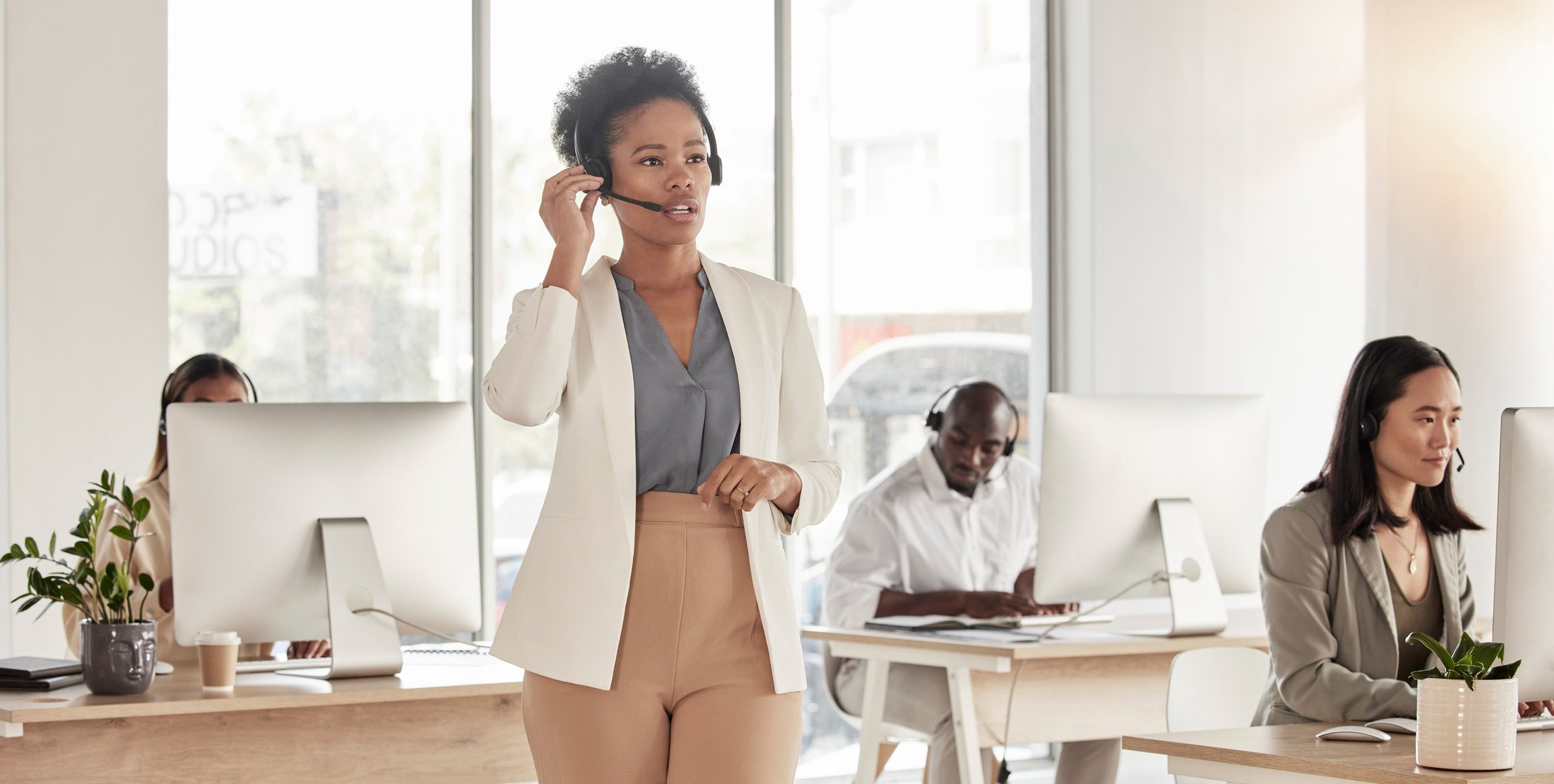 Call Center, Manager and Black Woman in Office, Sales Company and Coworking Customer Service Agency. Female Telemarketing Agent Talking on Headset for Consulting, Crm Advisory and Telecom Questions