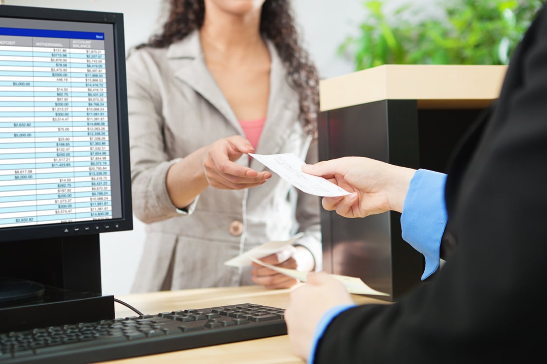 Bank Teller and Customer Banking Transaction in Retail Bank Counter